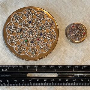 Vintage cosmetics set. Prior to 1950. Very ornate and show as being used.